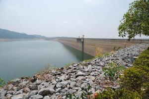 Behind of Khun Dan Prakan Chon Dam in summer season. photo