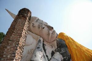 Face of Phra Si Mueang Thong, the reclining Buddha image of Wat Khun Inthapramun. photo