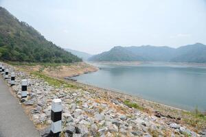 Water reservoir of Khun Dan Prakan Chon Dam in summer photo