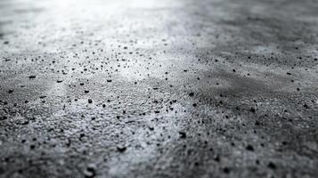 Close-up of a Rough, Gray Surface with Irregular Shapes and a Slight Gloss photo