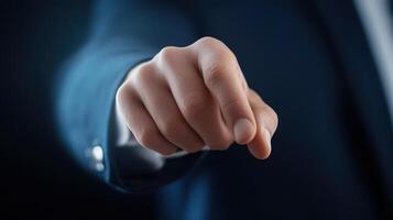 Determined Business Executive Clenching Fist in Office Facing Challenges photo