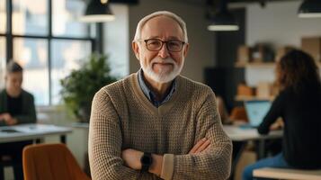 Senior man working as a mentor in a startup incubator, surrounded by his entrepreneurs, confident and wise photo