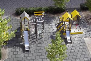 Modern colorful Children Playground with different slides photo