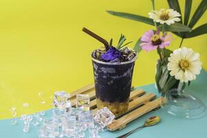 Butterfly Pea Drink and lemon flavored and blended into a drink. photo