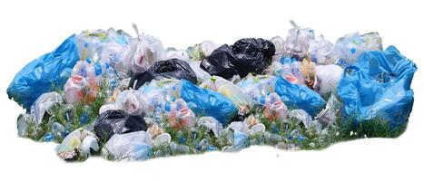 Isolated Pile of Plastic Waste and Garbage on White Background for Environmental and Recycling Concepts photo