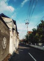 A Wall With A Letter Of Grafitti photo