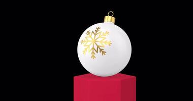 Christmas ball with a gold snowflake popping up animation with Alpha Channel video