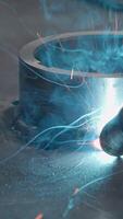Close-up welding with sparks and metal ring. Creative. Welder welds metal ring with sparks. Sparks from welding with metal ring at factory or in forge video