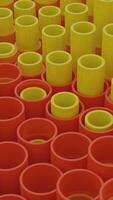 Moving tube columns. Design. 3D animation of tubes moving up and down. Colored 3d tubes move in waves video