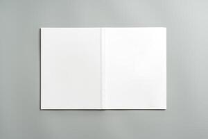 Empty White Sheet of Paper Positioned at an Angle on Light Gray Surface photo