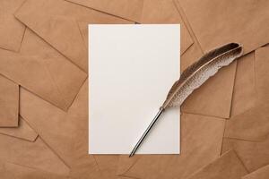 Pile of blank craft envelopes on table close up photo