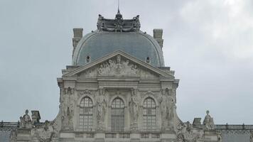 Low angle view of a gorgeous building with round shaped roof and statues. Action. Concept of architecture. video