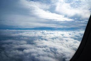 View through window of aircraft during flight photo