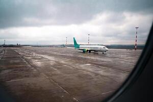 View through window of aircraft during flight photo