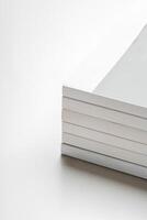Stack of blank paper on beige background photo