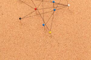 pins connected creating a network photo