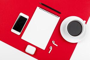 Mock up with copy space with smartphone on bright red background photo