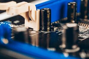 Computer electronic circuit board with processor close up photo
