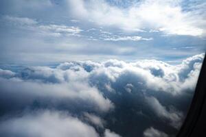 View through window of aircraft during flight photo