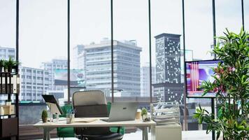 Empty business office equipped with modern tools to serve a corporation, workspace in a high end city center corporation. Global enterprise work environment, corporate culture. video