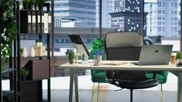 Empty high end corporation workspace with modern tools and gadgets that serve in the business industry. Corporate culture concept, career development with executive power. video