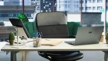 Modern work environment in a urban corporation downtown building, high end workspace with business analytics trends running on screen. Career development, office life concept. video
