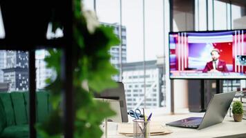 Empty urban corporate high end office designed for a person with authority, analytics and profit trends running on screen. Modern global enterprise workspace, business success. video