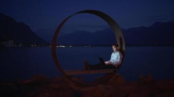 An Evening of Deep Contemplation by the Calm Waters Surrounded by a Unique Circular Sculpture video