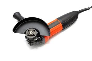 Handheld electric power tool. Powerful angle grinder on white background photo