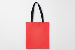 Empty fabric shopping bag on white background photo