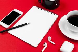 Mock up with copy space with smartphone on bright red background photo