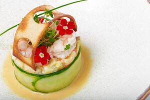 Fish dish - fried fish fillet with vegetables on white background photo