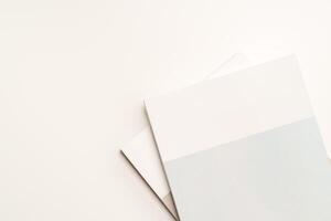 Stack of blank paper on beige background photo