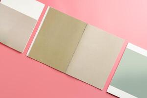 A Collection of Blank Papers Stacked on a Pink Surface for Creative Projects photo