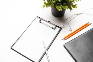 Home office workspace mockup with clipboard. Flat lay, top view. Template for blog, bloger, business photo