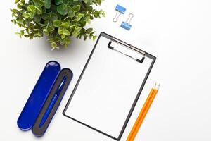 Home office workspace mockup with clipboard. Flat lay, top view. Template for blog, bloger, business photo