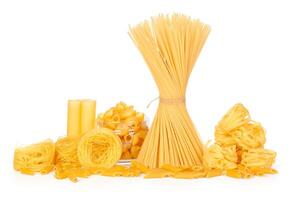 Delicious mixed pasta on white background photo