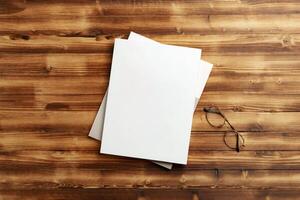 A Blank Notepad Resting on a Wooden Table in Natural Light During Daytime photo