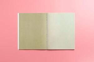A Collection of Blank Papers Stacked on a Pink Surface for Creative Projects photo