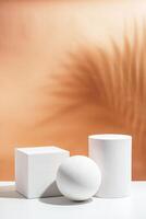 White geometric shapes arranged stylishly on a soft peach background in a minimalist setting photo