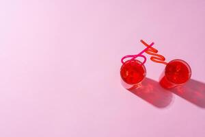 Summer drinks with straws on color background photo