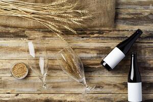 A bottle of beer and grain. Top view. Free space for text. photo