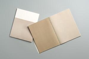 Open Blank Notebook on Minimalist Desk Surface in Soft Natural Light During Daytime photo