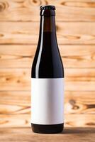 Blank label on the beer bottle on wooden background. photo