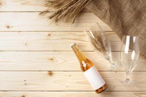 A bottle of beer and grain. Top view. Free space for text. photo
