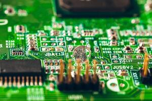 Close up of electronic circuit board with processor photo