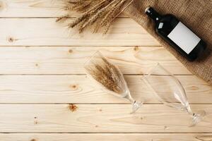 A bottle of beer and grain. Top view. Free space for text. photo