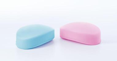 Pink and blue soap bars on white background photo