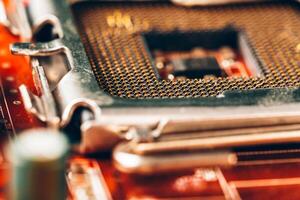 Computer electronic circuit board with processor close up photo