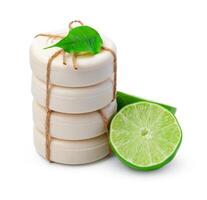 Handmade soap with lime on a white background photo